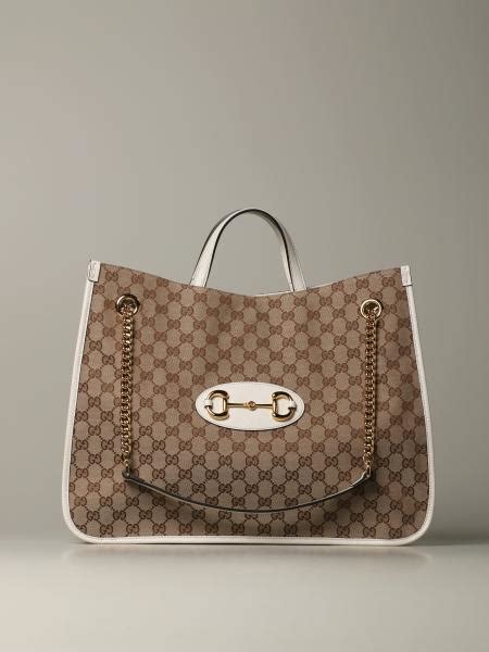 magazzini gucci|white gucci shopping bag.